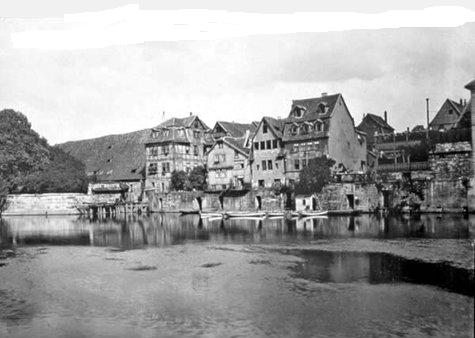  Mühle im 19. Jahrhundert vor ihrem Abriss von der Fuldabrücke gesehen 
